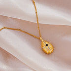 Vintage Shell Texture Starburst Cross Pendant Necklace